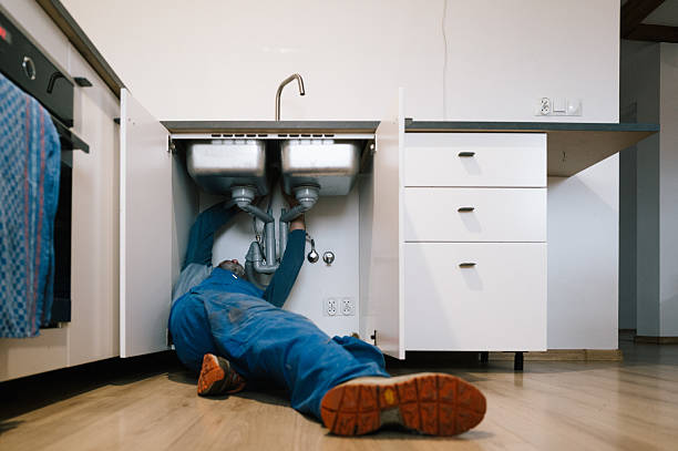 Professional Drain Cleaning technician working in Alexandria, VA